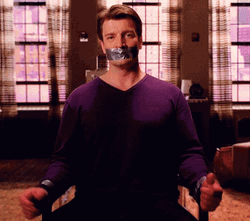 Victim Tape Mouth Nathan Fillion GIF