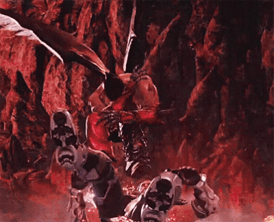 Video Game Character Attacked By Demon With Blood From Mouth GIF