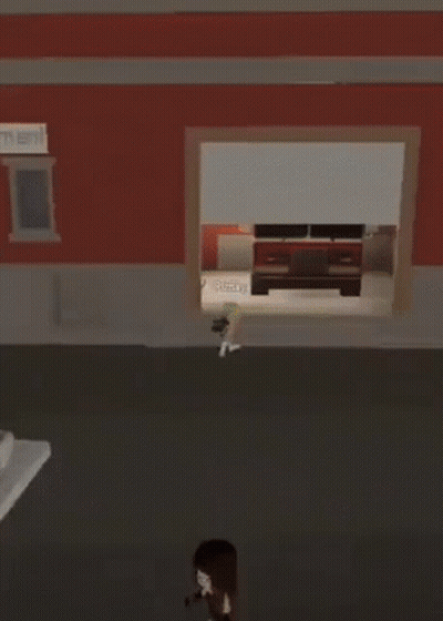 Video Game Character In Front Of Building With Fire Sign GIF