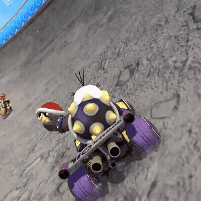 Video Game Character In Santa Hat On Purple Vehicle GIF