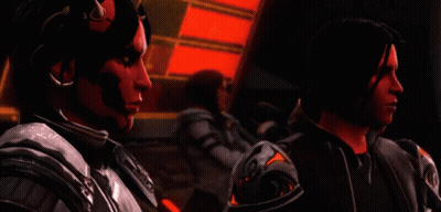Video Game Character With Horns Standing Next To Another Character GIF