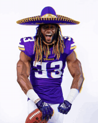 Vikings Player In Sombrero Holding Football GIF