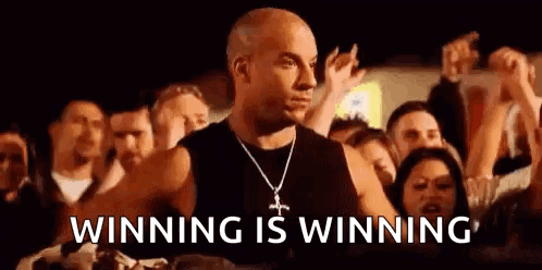 Vin Diesel Is Standing In Front Of A Crowd Of People And Saying Winning Is Winning . GIF