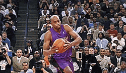 Vince Carter Twists Dunks GIF