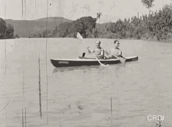 Vintage Canoe Riding GIF