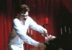 Vintage Dentist Pulling Teeth GIF