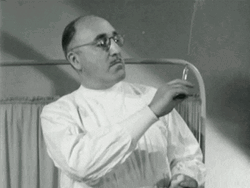 Vintage Doctor Holding Syringe GIF