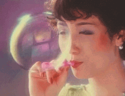 Vintage Retro Girl Popping A Bubble  GIF