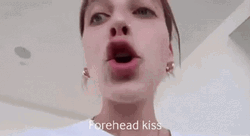 Vlogger Giving Forehead Kisses On The Camera