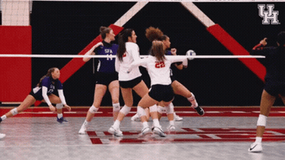 Volleyball Game In Front Of Wall Saying Uh GIF