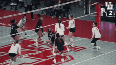 Volleyball Game On Court With Houston On Net GIF