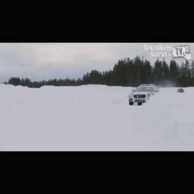 Volvo Police Car Driving In Snow With Ym25c08 Plate GIF