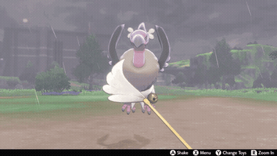 Vulture Holding Stick In Mouth GIF