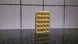 Waffle Bread Falling Over Massive Explosion GIF