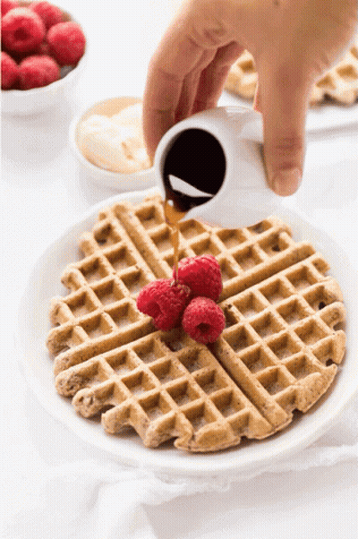 Waffle With Raspberries And Syrup GIF