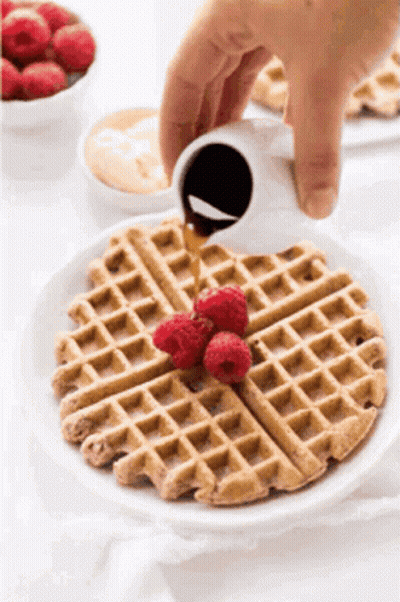 Waffle With Raspberries And Syrup GIF
