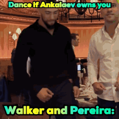 Walker And Pereira Are Dancing Together In A Room GIF