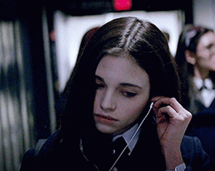 Walking India Eisley Putting On Earphones GIF