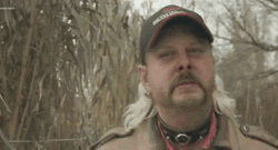 Walking Mullet Haired Joe Exotic GIF