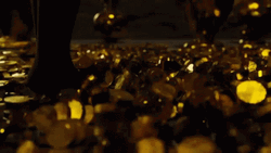 Walking Through Gold Coins GIF