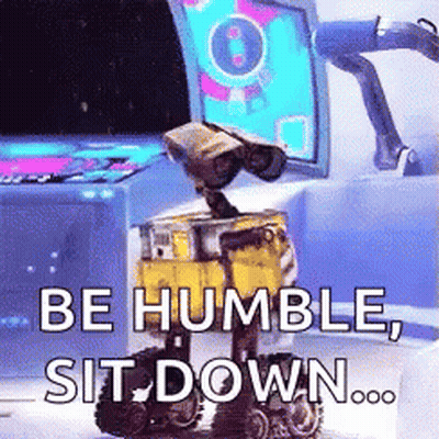 Wall E Says Be Humble Sit Down In Front Of Computer Monitor GIF