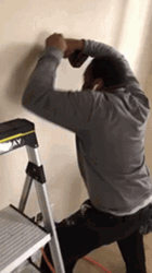 Wall Hammer Time GIF