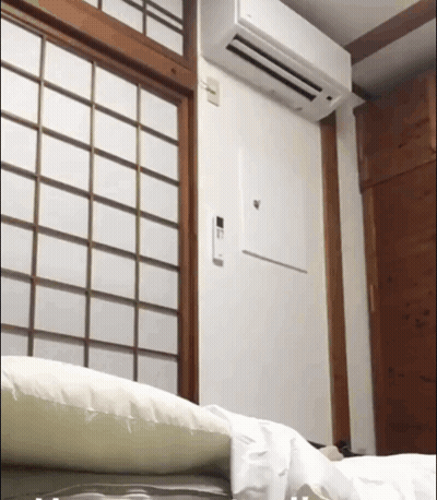 Wall-Mounted White Air Conditioner GIF