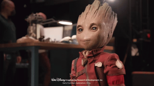 Walt Disney Advertisement Wooden Groot Doll GIF
