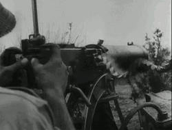 War Machine Gun In Grayscale GIF