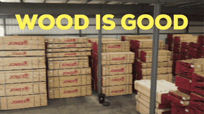 Warehouse With Boxes Saying Wood Is Good GIF