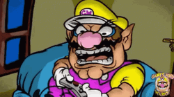 Wario Playing Online Games GIF