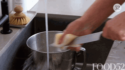 Washing Utility Knife In The Sink GIF