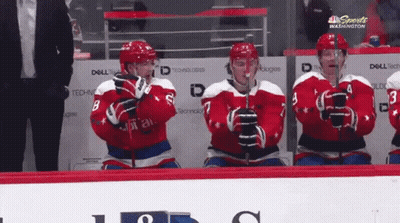 Washington Capitals Hockey Players Sitting On Bench GIF
