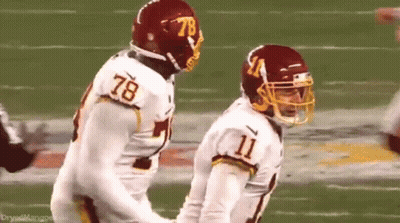 Washington Redskins Players Number 78 And 11 On Field GIF