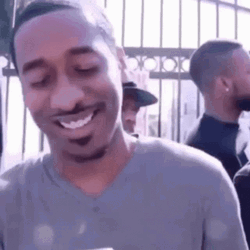 Watching Mobile Phone Laughing Meme  GIF