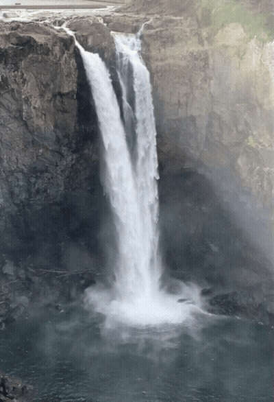 Waterfall Surrounded By Cliffs And Road GIF