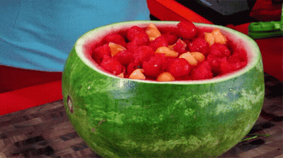 Watermelon Filled With Raspberries And Melons GIF