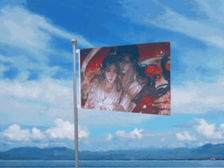 Waving Flag In The Sky GIF