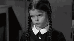 Little Wednesday Addams Horror Stares GIF | GIFDB.com