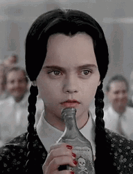 Wednesday Addams Drinking Vino GIF