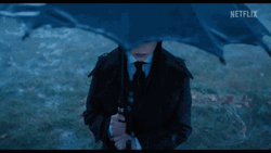 Wednesday Addams Holding Umbrella Rainy Wednesday GIF