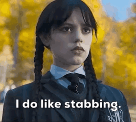 Wednesday Addams Likes Stabbing Meme GIF