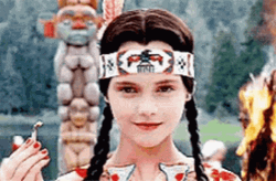 Wednesday Addams On Fire Background GIF