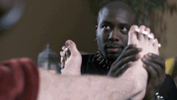 Weird Nat Zang Wink While Doing Foot Massage GIF