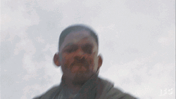 Welcome To Earth Will Smith Punch Alien GIF