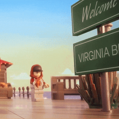 Welcome Virginia Sign Beside Lego Figure GIF