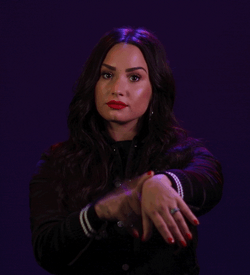 Were Waiting Demi Lovato Pointing At Wrist Watch GIF