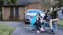 Were Waiting Man And Woman In The Driveway GIF