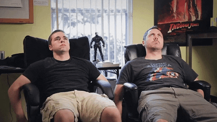 Were Waiting Two Men Sitting On Chairs GIF