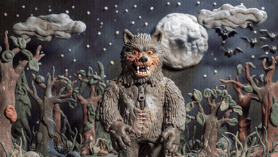 Werewolf Statue in Forest With Full Moon